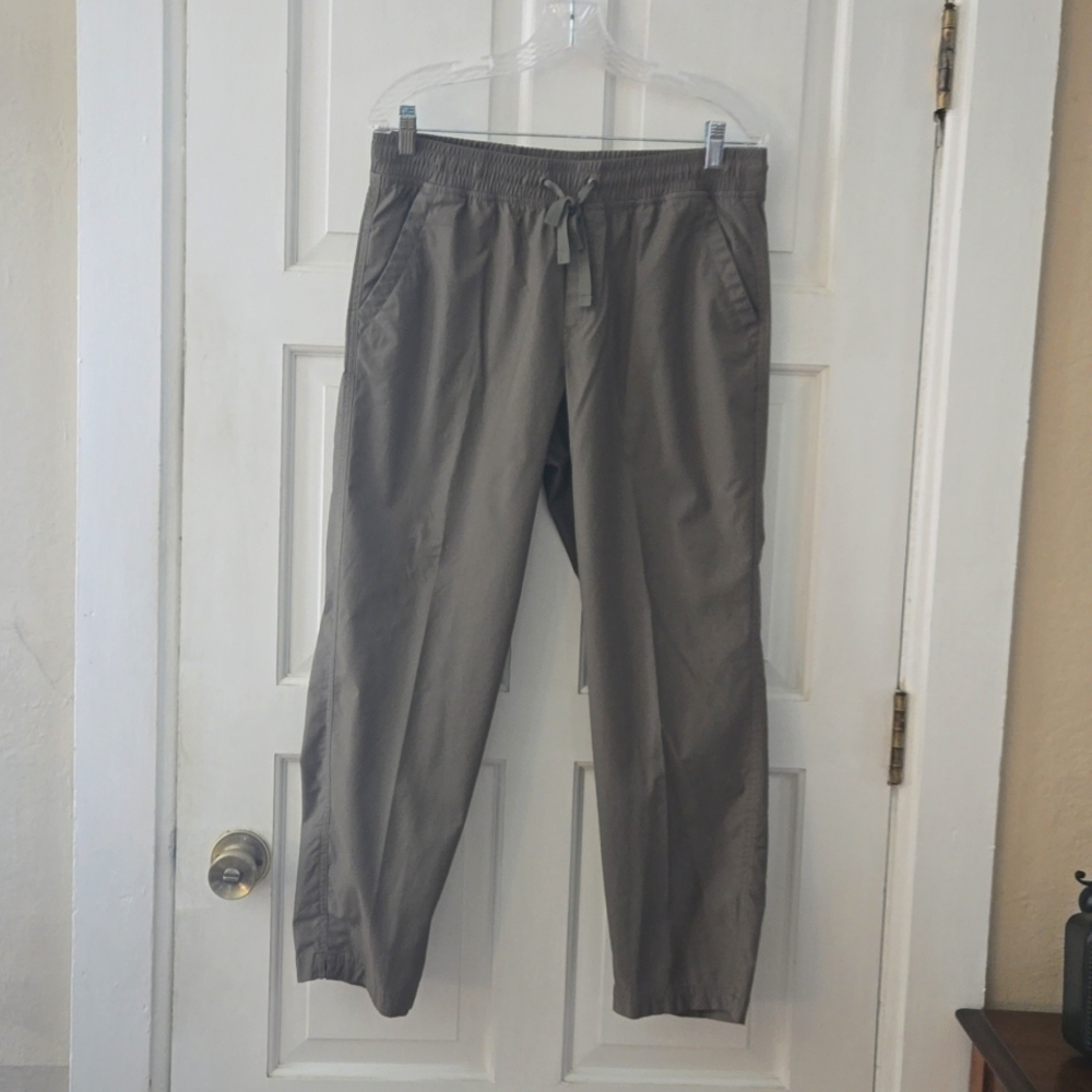 Slacks, olive green, slant pockets, drawstring, elastic waistband, slit at ankle